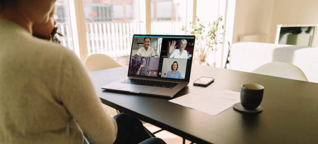 Business team meeting online over a video conference