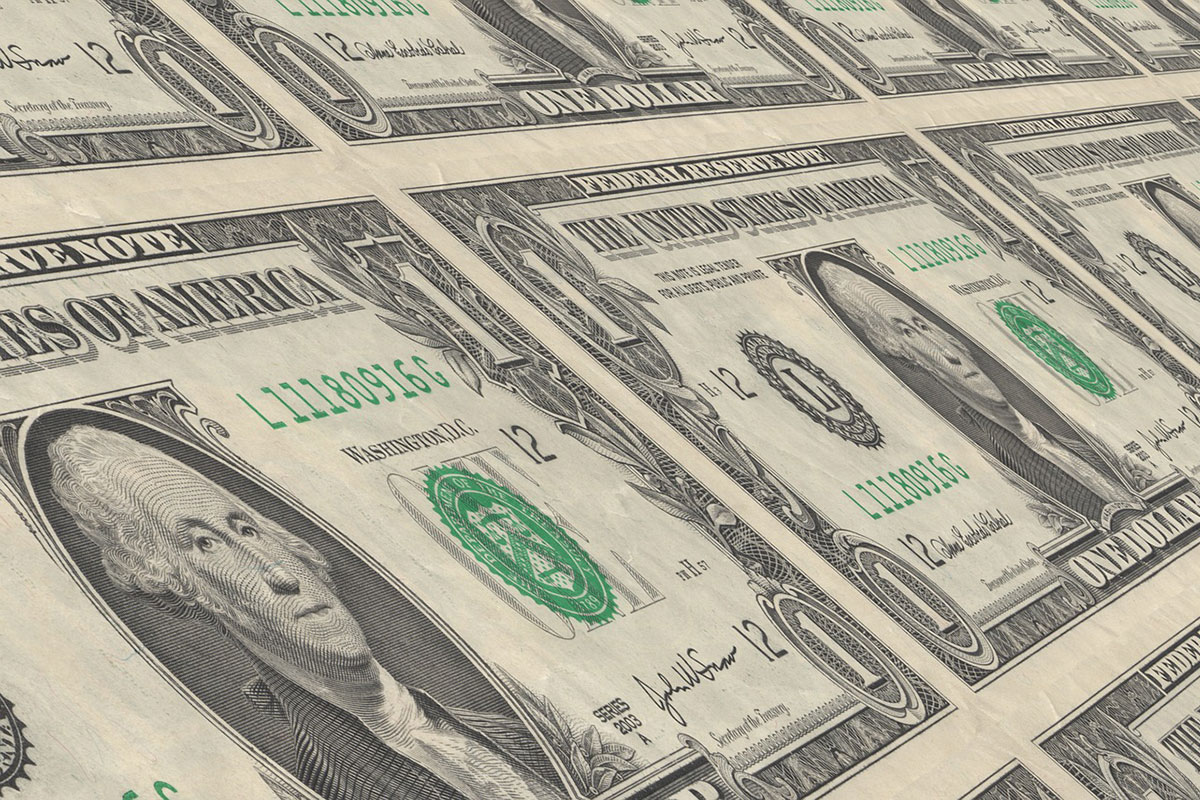 A sheet of U.S. one dollar bills